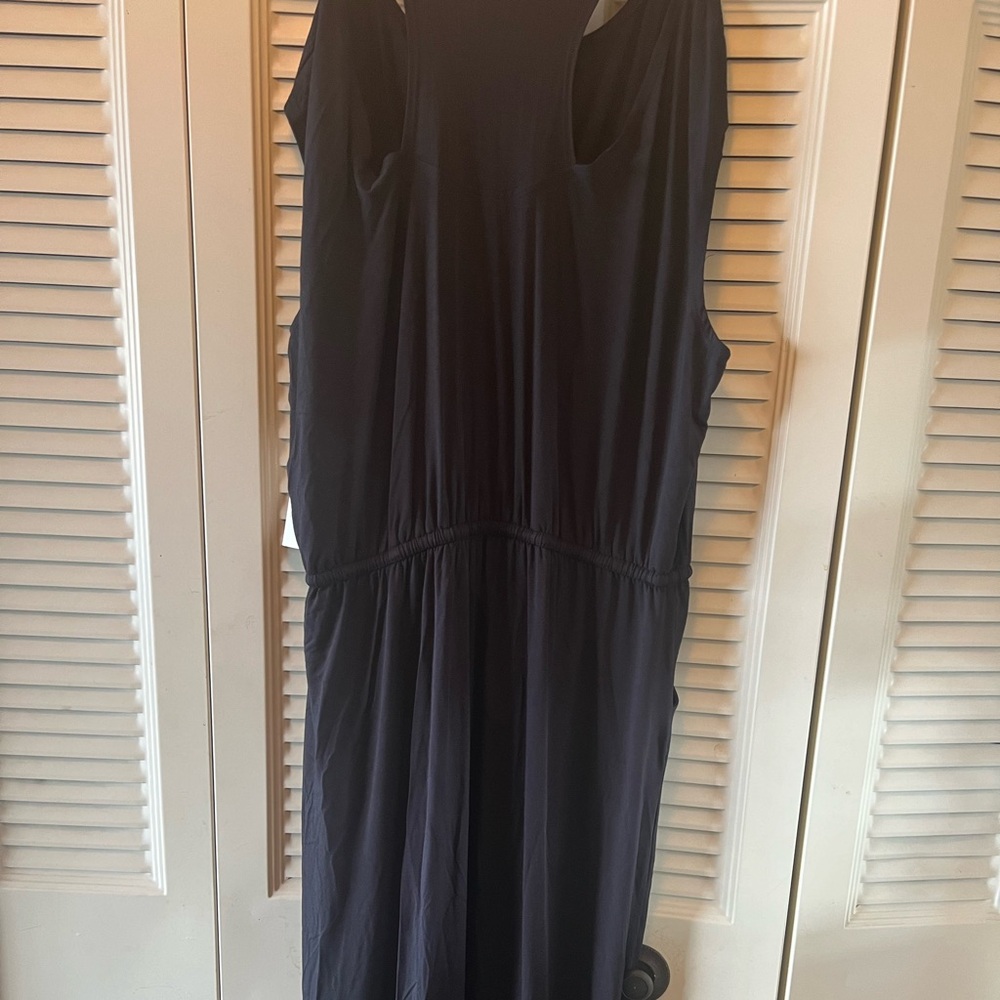 chicos black sleeveless dress with beige and white border and side slits!